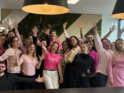 Bolton French team striking a pose and celebrating